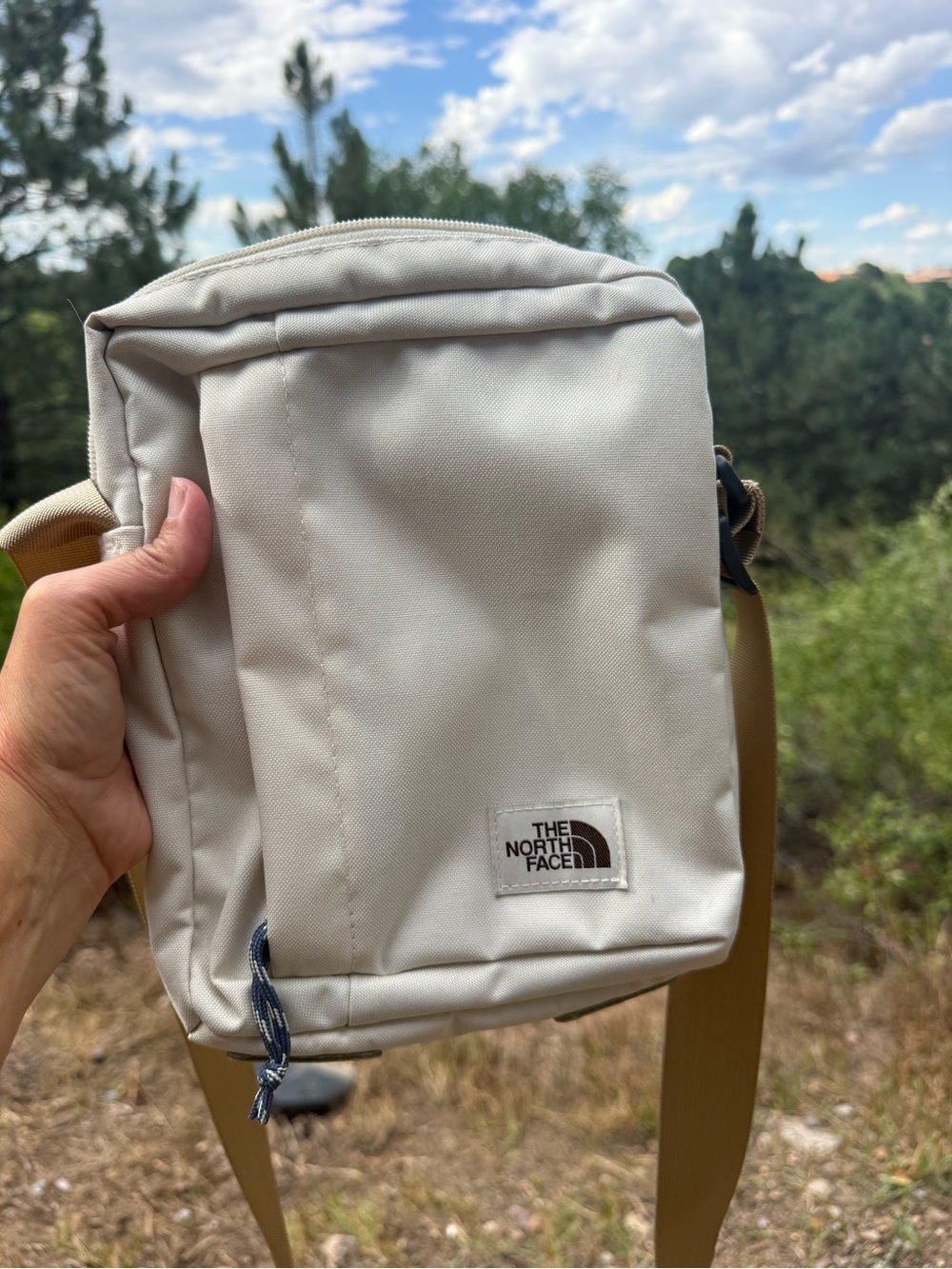 The North Face Cream Shoulder Crossbody Bag with Tan Strap